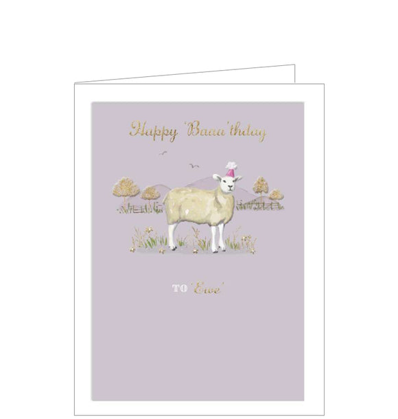 This cute birthday card is decorated with an illustration of a sheep - wearing a pink party hat - standing in a field of golden trees and grass. Gold text on the front of the card reads 