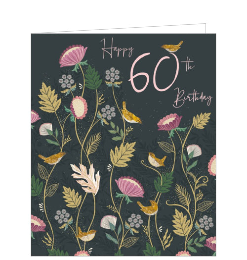 This absolutely gorgeous 60th birthday card is decorated with pink flowers and yellow foliage blooming on golden branches against a dark background. Pink text on the front of the card reads 