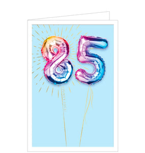 This fabulous 85th birthday card is decorated with a photograph of '85' birthday balloons in an ombre-style gradient of pinks, blues and yellows. The balloons are surrounded by gold confetti and have golden ribbons attached.