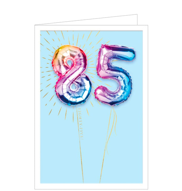 This fabulous 85th birthday card is decorated with a photograph of '85' birthday balloons in an ombre-style gradient of pinks, blues and yellows. The balloons are surrounded by gold confetti and have golden ribbons attached.
