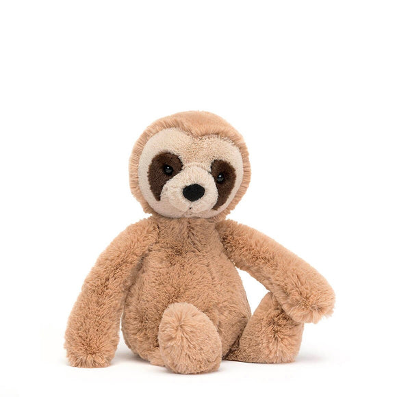Photograph of Jellycat's cute bashful sloth - with pale brown fur, a cream face and dark markings around the eyes