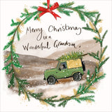 Part of Alex Clark's Christmas card collection, this Christmas card for a special grand-son is decorated with Alex's painting of a  landrover with christmas tree driving over the moor. A Christmas wreath forms a border. The text on the front of the card reads "Merry Christmas to a wonderful Grandson.".