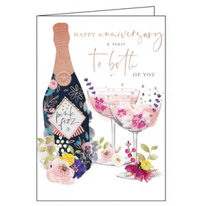 This beautiful anniversary card is decorated with a flower-covered bottle of champagne, next to two coupes filled with pink fizz. Gold text on the front of the card reads "Happy Anniversary, a toast to both of you".