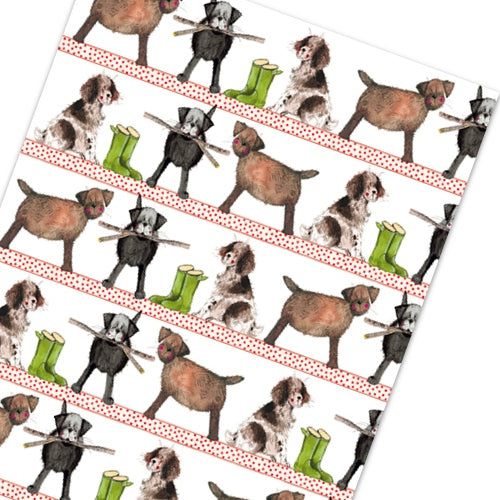 This Alex Clark wrapping paper features a repeating design of smiling dogs - with sticks and wellies, ready for a country walk.