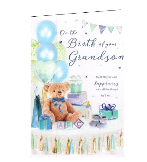 This new grandson card is decorated with a still life of a table decorated with balloons and gifts to celebrate the new arrival. Metallic blue text on the front of the card reads 