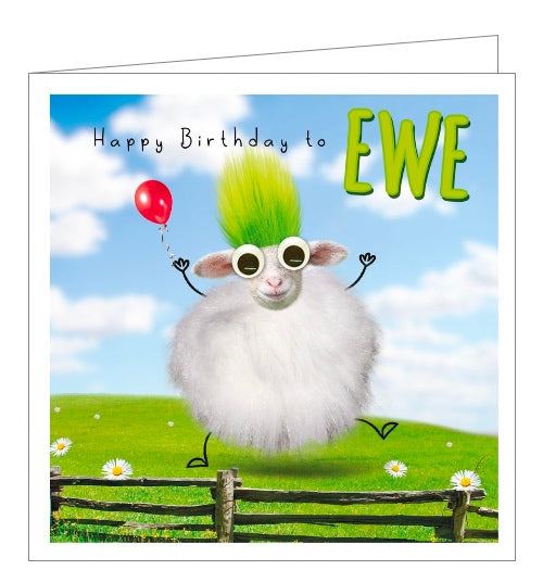 This quirky birthday card  is decorated with a dancing sheep holding a balloon. The sheep has googly eyes and a tuft of green fluffy hair. The text on the front of the card reads  