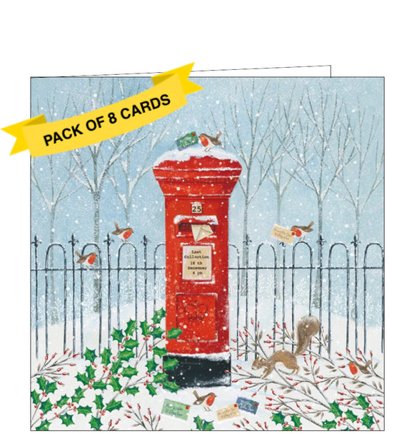 This pack of charity Christmas cards includes 8 cards of one design. The cards are decorated with an illustration by Emma Freeman showing a host of woodland animals coming to post their Christmas cards in a snow-covered red postbox.