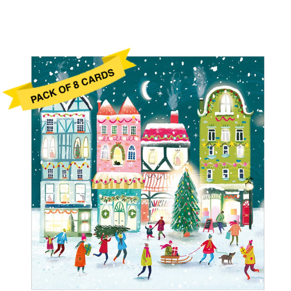 This pack of charity christmas cards are decorated with a cheerful snowy village full of people getting ready for Christmas.