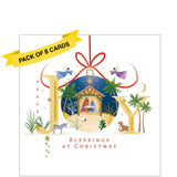 This pack of charity Christmas cards contains 8 cards of one design. The front of the cards are decorated with an illustration of a small nativity scene within a bauble. The text on the front of the cards reads "JOY...Blessings at Christmas".