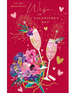 This luxurious valentines card for a very special wife is decorated with a pair of champagne flutes, fizzing with pink champagne and gold bubbles, beside a bouquet of richly coloured flowers. Gold text on the front of the card reads "To my beautifulful Wife on Valentine's Day".