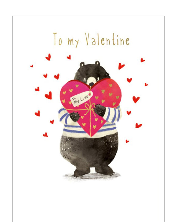 An shy bear hides behind a large, heart shaped box of chocolates on this valentine's day card. Gold text on the front of the card reads 