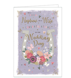 This wedding card for a special nephew and his new wife is decorated a large white horseshoe, adorned with flowers and butterflies. Gold text on the front of the card reads "For special Nephew and his Wife...Congratulations on your Wedding Day".