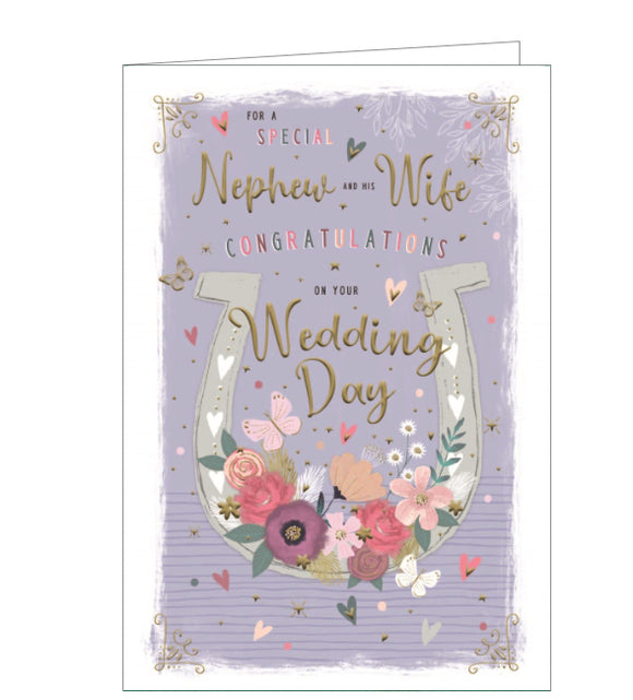 This wedding card for a special nephew and his new wife is decorated a large white horseshoe, adorned with flowers and butterflies. Gold text on the front of the card reads 