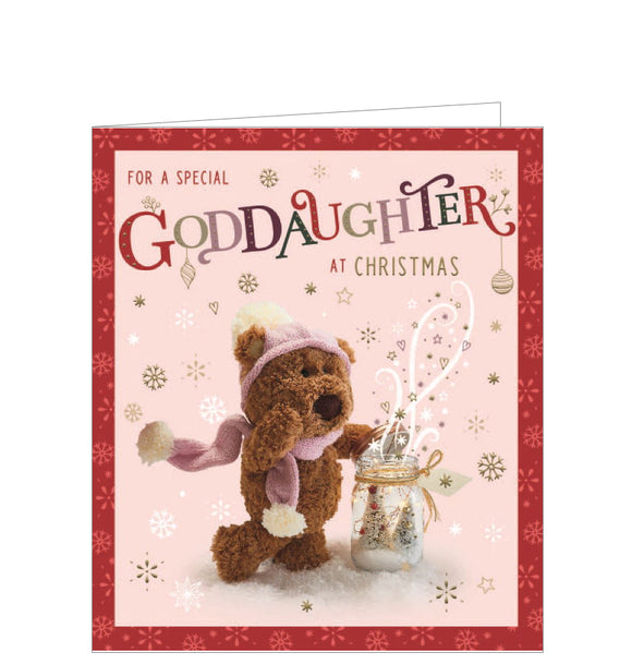 This Christmas card for a special goddaughter is decorated with a cute little Barley the Brown Bear, dressed in a matching pink hat and scarf, playing in the snow. The text on the front of the card reads 