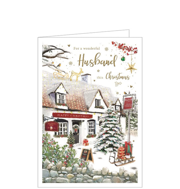 This Christmas card for a special husband is decorated with a scene of a snow-covered country pub. Gold text on the front of the card reads 