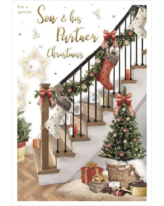 This Christmas card for a special son and his partner features a homely scene of a decorated staircase with garlands, tree and presents. Red metallic&nbsp;text on the front of the card reads "For a special Son &amp; his Partner at Christmas"