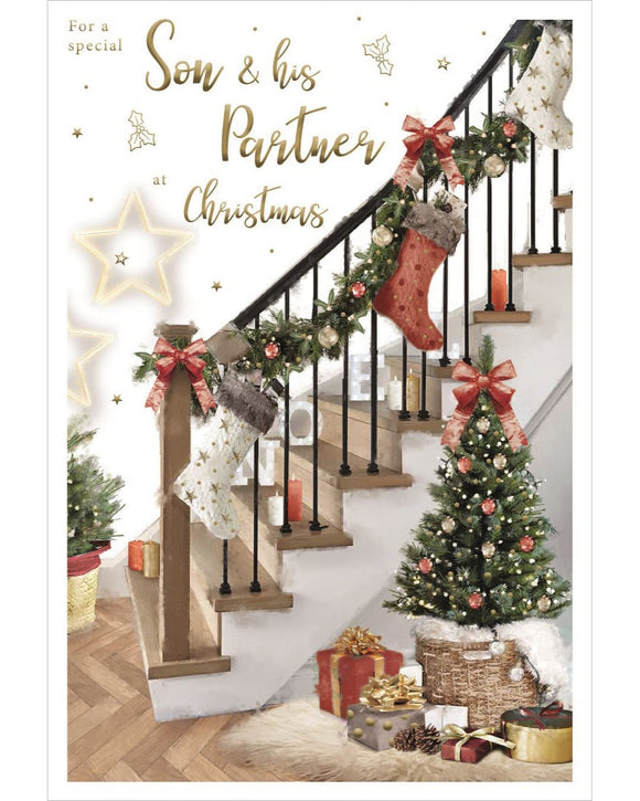 This Christmas card for a special son and his partner features a homely scene of a decorated staircase with garlands, tree and presents. Red metallic text on the front of the card reads 