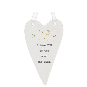 This ceramic plaque from Thoughtful Words Ceramics is an ideal gift to remind someone how much they are loved. The white glazed heart is decorated with black text that reads "I love YOU to the moon and back", beneath a scattering of tiny stars and a crescent moon.