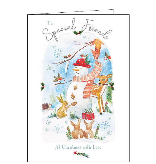 This beautifully designed Christmas card will warm the heart of your special friends. Featuring a heartwarming image of a snowman being dressed by the small wild animals of the forest, this card is sure to bring a smile to their face as you remember them at christmastime.
