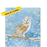 This pack of charity Christmas cards contains 5 cards of one design. The front of the cards are decorated with an illustration by Tim Mason showing a majestic owl perched on a branch.