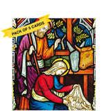 This pack of charity Christmas cards contains 5 cards of one design. The front of the cards are decorated with a photograph showing detail from a stained glass window telling the story of the nativity.