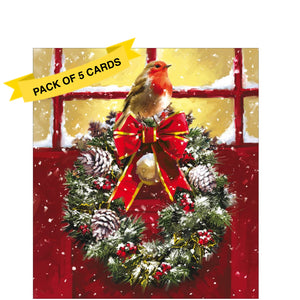 This pack of charity Christmas cards contains 5 cards of one design. The front of the cards are decorated with a stunning illustration by Richard Macneil showing a beautiful wreath-adorned red front door and a bold robin perched on top of the wreath.