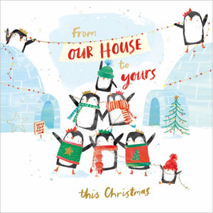 This adorable Christmas card for a special family is decorated with a gang of cute penguins - dressed in jumpers, scarves and hats - holding banners and strings of fairylights that read "From our house to yours this Christmas".