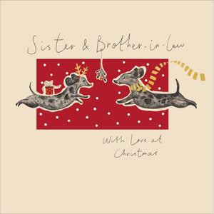 This adorable Christmas card for a special sister and brother in law is decorated with a cute illustration of a pair of dogs leaping towards each other under a sprig of mistletoe. The caption on the front of this Christmas card reads "Sister &amp; Brother-in Law with love at Christmas".