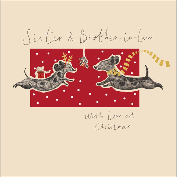 This adorable Christmas card for a special sister and brother in law is decorated with a cute illustration of a pair of dogs leaping towards each other under a sprig of mistletoe. The caption on the front of this Christmas card reads 