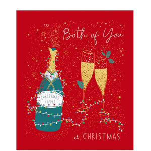 This festive Christmas card features a bottle of Christmas tipple and two glasses, surrounded by twinkling lights on a red background. The caption on the front of this card reads "To Both of You at Christmas".