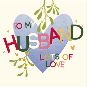 This christmas card for a special husband is decorated with a big blue heart and a bunch of mistletoe. Big, brightly coloured text on the front of the card reads "To my Husband...lots of love".

The perfect card to express your love at this festive season.