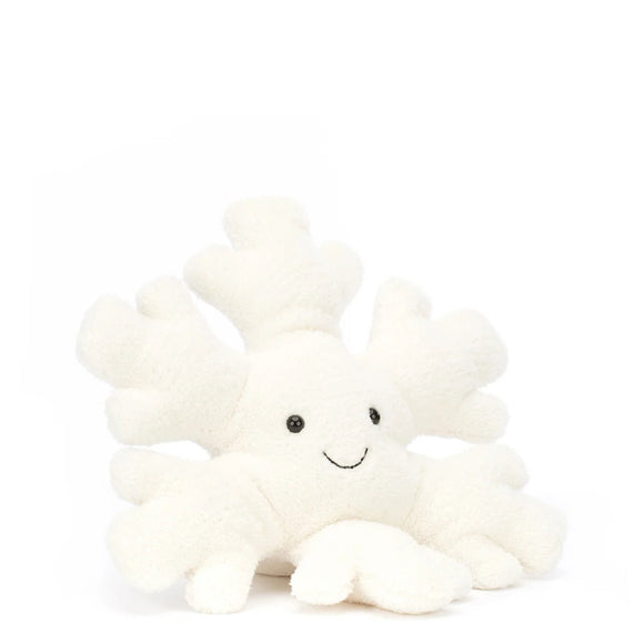 New for Christmas 2023, Jellycat's Snowflake is a scrumptious flurry of white fur! Look at him face on and he has a happy smile, and at the back he has a body that fits snuggly into little hands.