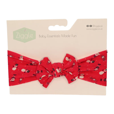 Finish off little Christmas day outfits with this gorgeous festive red headband with an all over snowman print from Ziggle.

It's perfect for little fashionistas and even fits Mummas, allowing you to match with your little one. With its stretchy, comfortable material, this headband is easy to slip on and won't irritate your baby's delicate skin. Create a perfect bow every time and add a touch of elegance to any look with this unique headband.