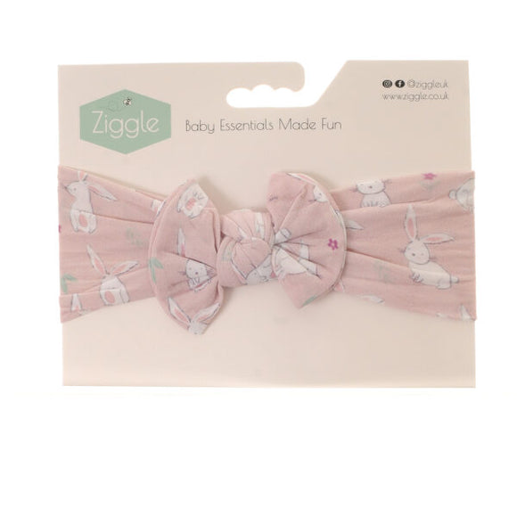 Finish off little outfits with this cute dusky pink headband with an all over white bunny rabbit print from Ziggle.

It's perfect for little fashionistas and even fits Mummas, allowing you to match with your little one. With its stretchy, comfortable material, this headband is easy to slip on and won't irritate your baby's delicate skin. Create a perfect bow every time and add a touch of elegance to any look with this unique headband.
