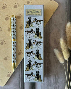 Bring a touch of countryside charm to your everyday writing with this elegant ballpoint pen from Alex Clark. Featuring a charming repeating design of a pack of dogs, this pen is a beautiful blend of nature and functionality.