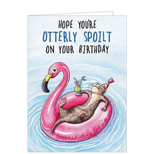 This funny birthday card from the Bewilderbeest range is decorated with an illustration of an otter sipping a cocktail while relaxing on a flamingo float in a pool. The text on the front of the card reads "Hope you're OTTERLY SPOILT on your Birthday".