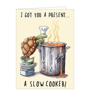 This funny birthday card from the Bewilderbeest range is decorated with an illustration of tortoise in a chef's hat, standing on a pile of plates and cookbooks to stir a cooking pot. The caption on the front of the card reads "I got you a present...A slow cooker!"