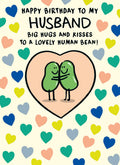 This birthday card for a special husband is decorated with a cute illustration of a pair of beans hugging in the centre of a heart, and surrounded by different coloured mini hearts. The text on the front of the card reads "Happy birthday to my Husband, Big Hugs and Kisses to a lovely Human Bean".