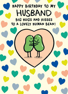 This birthday card for a special husband is decorated with a cute illustration of a pair of beans hugging in the centre of a heart, and surrounded by different coloured mini hearts. The text on the front of the card reads "Happy birthday to my Husband, Big Hugs and Kisses to a lovely Human Bean".