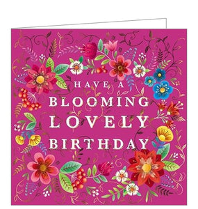 This is a stunning range of birthday cards, reminiscent of traditional European folk art. White text in the centre of the card reads "Have a blooming lovely Birthday" surrounded by a wreath of richly coloured blooms and foliage, all finished with touches of gold.
