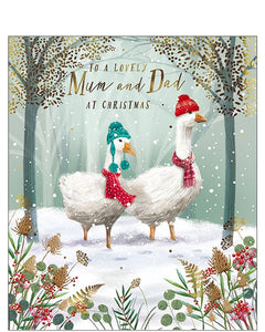 Celebrate the season with this beautiful Christmas card for Mum and Dad, featuring a heartwarming winter scene. The illustration shows a pair of white geese dressed in cosy woolly hats and scarves, enjoying a peaceful walk through a snowy forest.

Elegant gold text on the front reads "To a Lovely Mum and Dad at Christmas",
making it the perfect way to send love and holiday wishes to your parents this festive season.