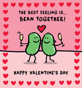 This valentine's card is decorated with a cute illustration of  of Lucilla lavendar's  smiling beans  arm in arm, and champagne in hand. The text on the front of the card reads  "The best feeling is bean together....Happy valentine's Da