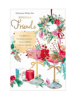 This lovely Christmas card for special friends is decorated with a pair of champagne couples, filled with pink champagne and garnished with festive flowers, foliage and golden bows. The caption on the front of this Christmas card reads "Christmas Wishes for Special Friends...The BEST of Christmas moments bring a SMILE a lifetime through..."