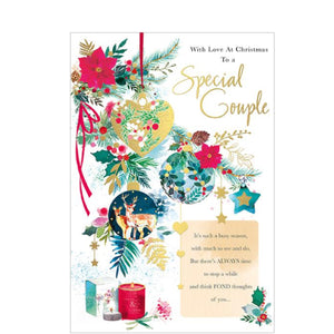 Celebrate the holidays with this beautiful traditional Christmas card. Inset with thoughtful words, this card features hanging baubles in rich colours and festive trimmings. Perfect for that special couple in your life! Text on the front of this christmas card reads "With Love at Christmas to a Special Couple...It's such a busy season with much to see and do, But there's always time to stop a while and think fond thoughts of you...."