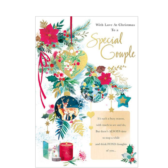 Celebrate the holidays with this beautiful traditional Christmas card. Inset with thoughtful words, this card features hanging baubles in rich colours and festive trimmings. Perfect for that special couple in your life! Text on the front of this christmas card reads 