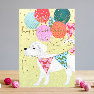 This Louise Tiler birthday card is the perfect way to wish someone a happy birthday. Featuring a white dog enthusiastically tugging at a string of bunting, colourful balloons, and gold confetti, this card is sure to bring a smile to the recipient's face. Gold text on the front of the card reads "Happy Birthday".