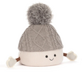 A official Jellycat (jelly cat) Christmas 2026 Amuseables Pomilly cute pom-pom woolly hat plush cuddly toy in grey and white with smiing face and outstretched arms