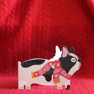 This adorable and unusual christmas card is cut into the shape of a french bulldog looking very dapper in a red, white and pink christmas scarf.