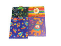 four colorful children's birthday gift bags with rainbow, gaming and space-themed designs, one dark blue with astronauts and planets, and one purple with a rocket and 'Happy Birthday' text