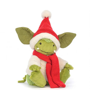 Jellycat's Christmas Grizzo is cosied up in a knitted scarf and Pom Pom hat. With a fluffy cream coat, green velour ears, a springy tail and a mossy bottom, as well as soft fangs and beans feet, Grizzo’s a gift for any little gremlin.